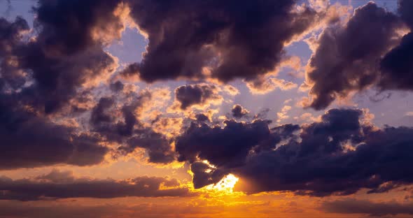 Clouds Fly Across the Sky at Sunset alt