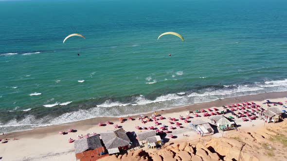 Tropical tourism landmark. Summer travel. Canoa Quebrada Beach at Brazil alt