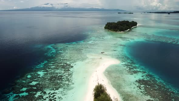 Drone shot of Lumbaria Island, also known as Kennedy Island where John F. Kennedy stranded in World alt