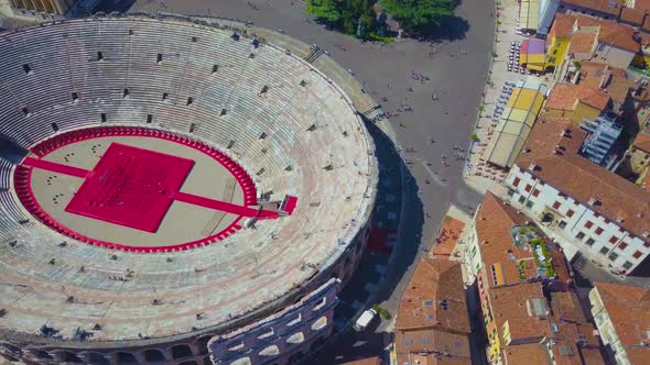 Aerial View Of Arena Di Verona,Italy. The drone flies over the Arena and over the houses of the city alt