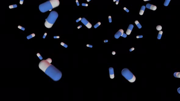 Blue-white medicines falling down pills, antibiotics, vitamins