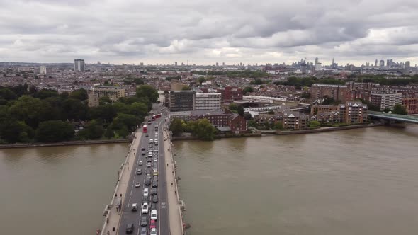 Drone View of the Fulham Railway Bridge and Car Traffic on the Putney Bridge