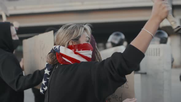Masked Youth Protesting Outside alt