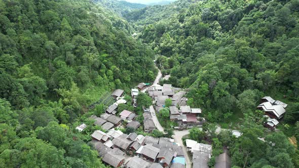 Aerial view of Mae kampong village,  Houses in valley, Chiang Mai, Thailand by drone