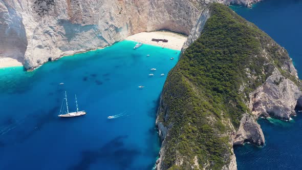 View of Navagio beach, Zakynthos Island, Greece. Blue sea water. Rocks and sea. alt