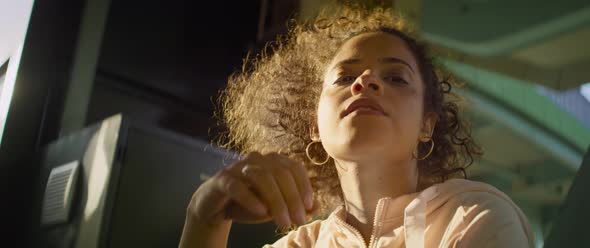 Tracking video of beautiful woman during sunset. Shot with RED helium camera in 8K. alt