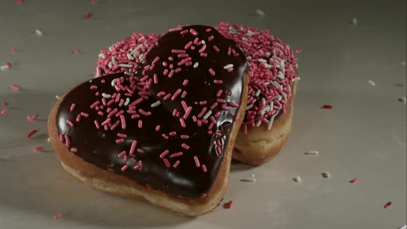 Doughnuts falling and bouncing in ultra slow mo 1500fps - reflective surface - DOUGHNUTS PHANTOM 020 alt