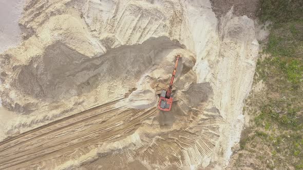 Excavator Load the Sand Into Dump Truck