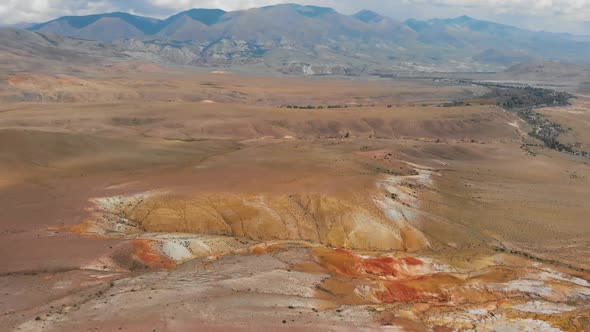 Aerial Video of the Textured Yellow and Red Mountains Resembling the Surface of Mars
