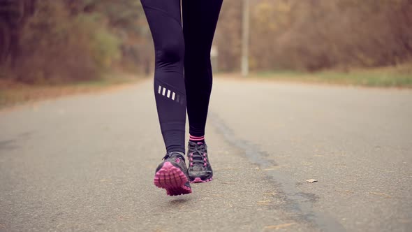 Marathon Runner Legs Jog Workout. Running Shoes Female Healthy Lifestyle. Runner Woman Fit Athlete. alt