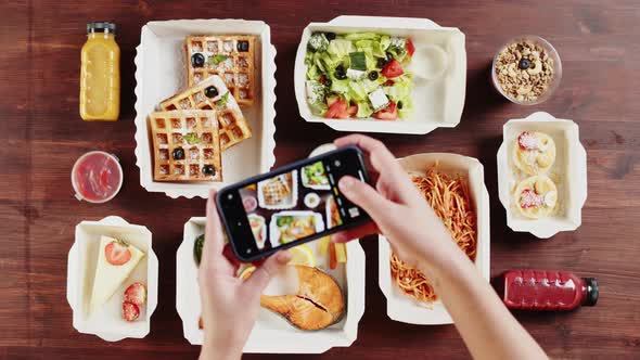 Food Delivery Top View Take Away Meals in Disposable Containers on Wooden Table alt