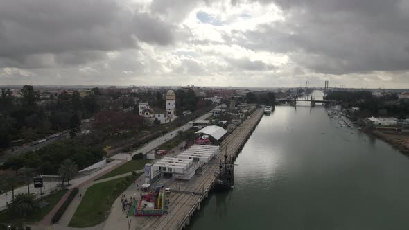Seville Cruise Terminal on cloudy day, Spain. Scenic aerial forward