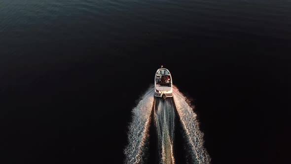  Boat Sailing in Black Water