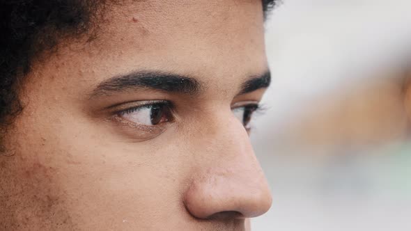 Side View Closeup Male Sad Face in Profile Detail Eyes African American Man Thoughtful Guy Looking alt