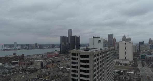 Aerial view of downtown Detroit and surrounding neighborhood on a cloudy and gloomy day. This video alt