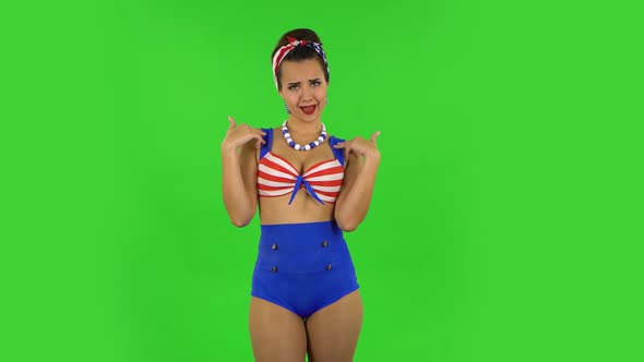 Indignant Girl in a Swimsuit Is Pointing Herself, Say Who Me No Thanks i Do Not Need. Green Screen alt