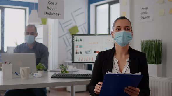 Pov of Business Woman with Medical Face Mask Working at Communication Project alt