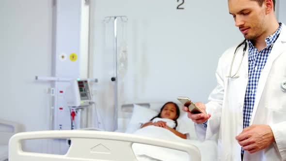 Doctor talking on mobile phone alt