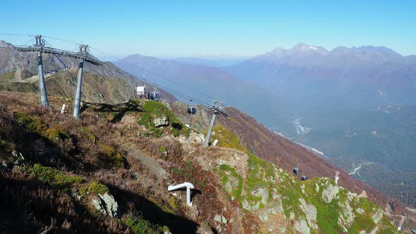 Moving Cabins of the Cable Road. Funicular with Words Rosa Khutor on Cabins. Russia. alt