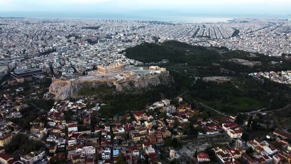 Morning Drone Shot of Acropolis of Athens Against the Backdrop of Greek Streets