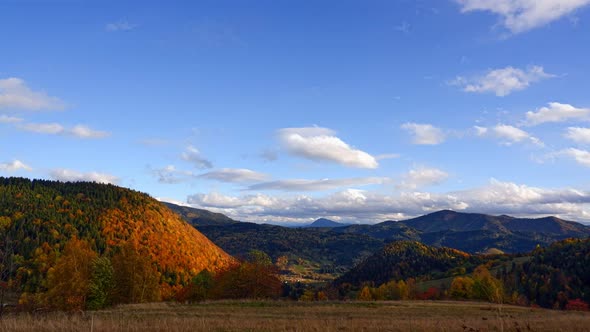 Beautiful autumn landscape, blue sky with clouds alt