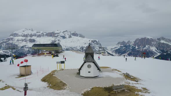 Aerial, Ski Facilities On Top Of Snowy Dolomites Mountains, In Italy