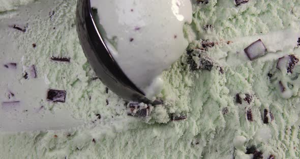 Top View of Mint Flavour Ice Cream with Chocolate Flakes and Scoop