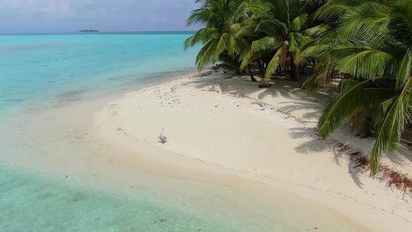 Drone Flying Along Wild Empty Maldive Island Beach