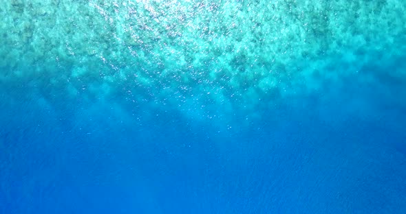 Natural aerial abstract shot of a white sandy paradise beach and blue water background in vibrant  alt