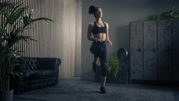 Athletic Woman Doing High Knee Exercise at Home. Home Training Workout. Home Fitness alt