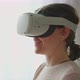 Young Female in VR Goggles Experiencing Virtual World - VideoHive Item for Sale