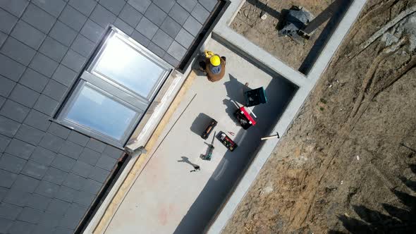 Construction Worker Finishing Balcony Elements in Newly Developed Modern House alt