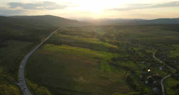 Sunset In The Carpathians. Countryside. Spruce Forests