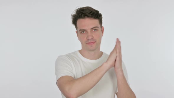 Happy Young Man Clapping on White Background alt