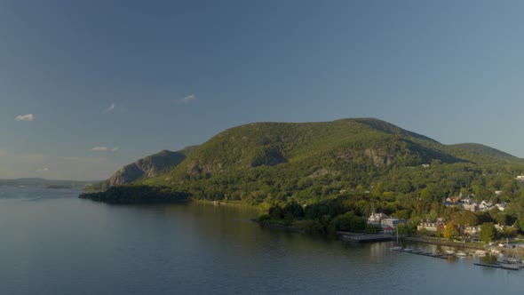 Aerial of Breakneck Ridge and settlement on coast of Hudson river alt