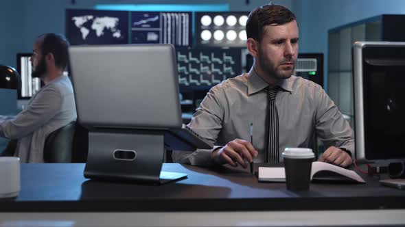 Portrait of Business Trader Professional Working in a Stock Market Company Office alt