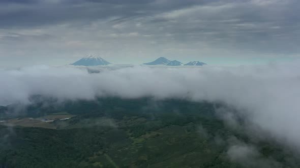 Clouds and Volcano on Kamchatka alt