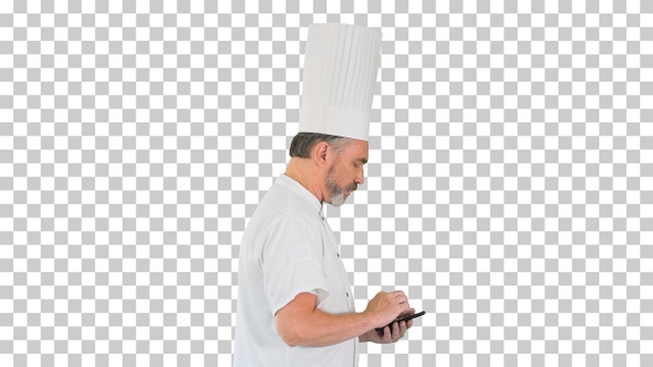 Bearded man cook walking and using mobile phone, Alpha Channel alt