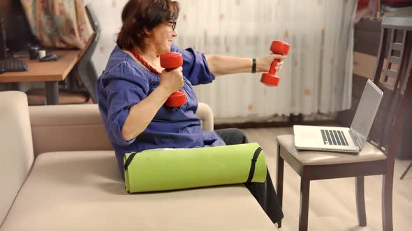 Old Granny Workout With Dumbbells On Home. Elderly Older Woman Wellness Healthy Lifestyle. alt