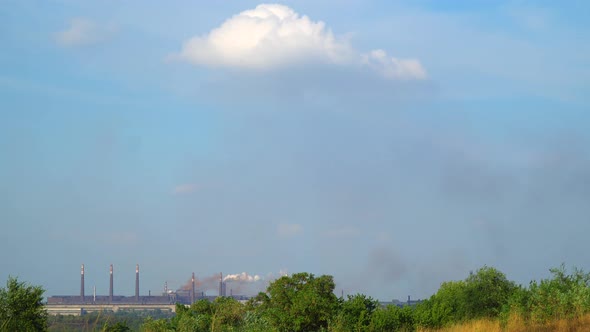 Smoke From the Metallurgical Plant Against the Blue Sky