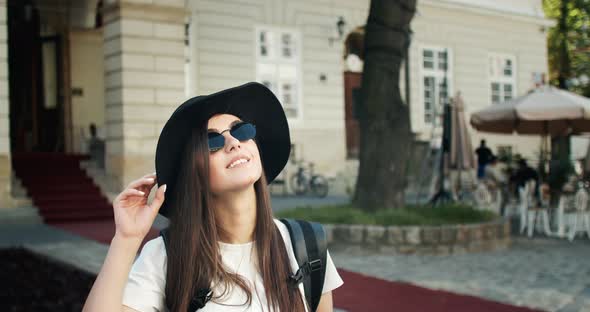 Tourist Girl Taking Photo on Smartphone