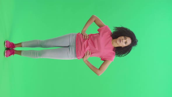 Portrait of Young Female African American Swears and Shakes Viciously with His Index Finger alt