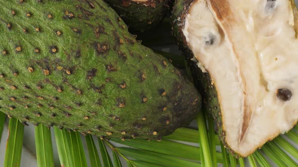 Closeup of Green Soursop Graviola, Exotic, Tropical Fruit Guanabana on Plate alt