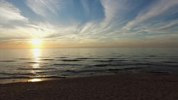 Sun setting at Lake Michigan alt