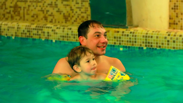 Father with Sons in Pool 1