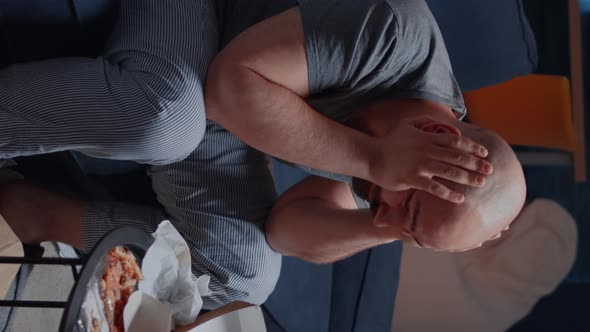 Vertical Video Stressed Lonely Man with Headache Feeling Vulnerable alt