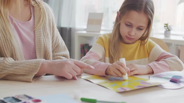 Mom and Daughter Making Cutout alt