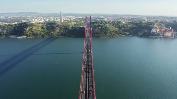 Aerial View of Busy Car Lanes Along Suspension Bridge alt