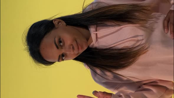 Portrait of Pretty African Woman Making Ok Hand Gesture alt