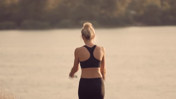 Woman Exercising With Skipping Rope. Outdoor Jump Workout Practicing. Jump Rope Exercises. alt